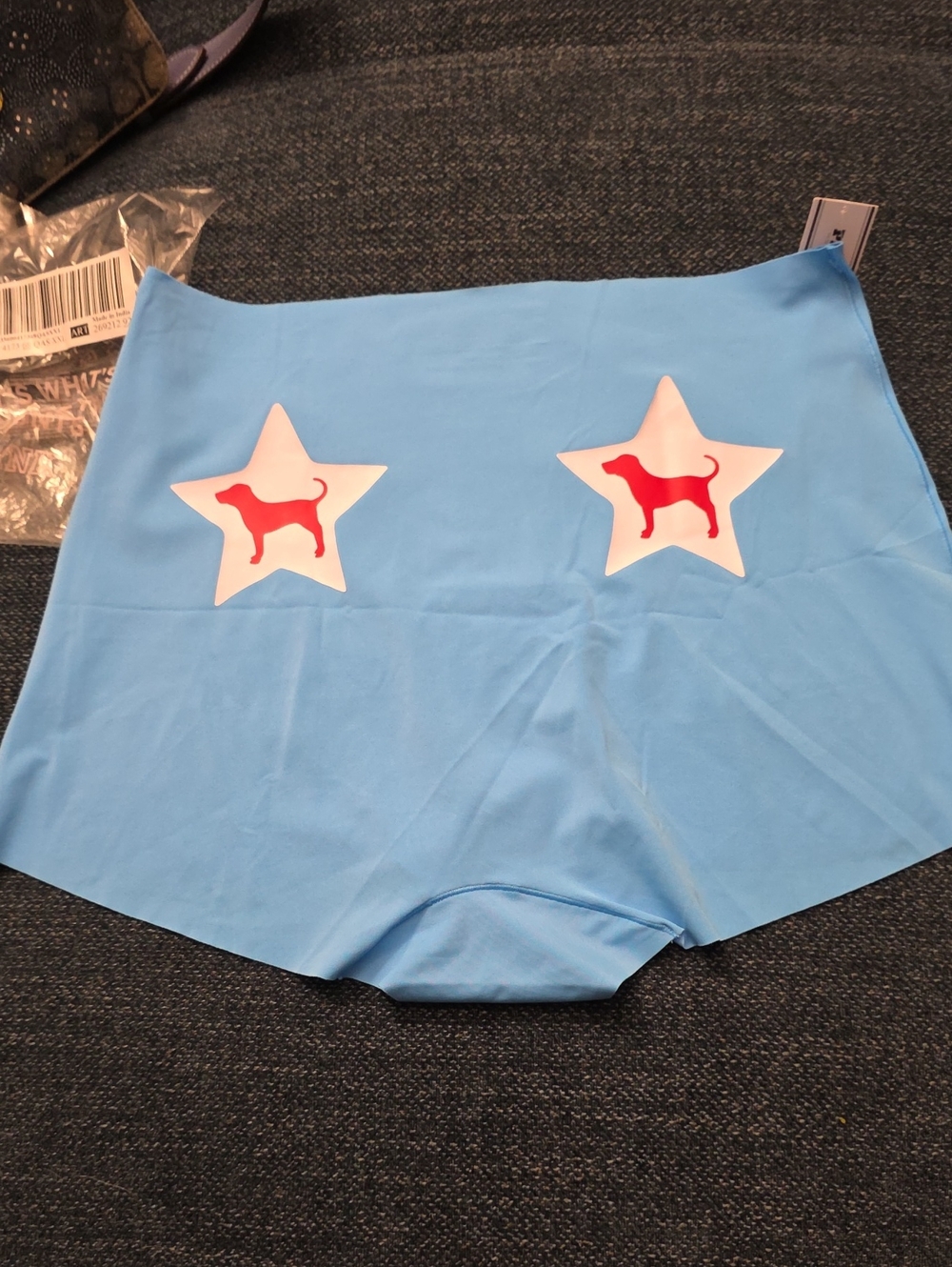 PINK Victoria's Secret Light Blue Shorts with White Star & Red Dog Graphics